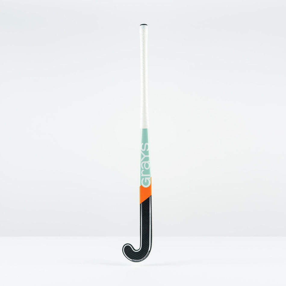 The Grays JB 5 Junior Hockey Stick 2026 stands upright against a plain white background, showcasing its Jumbow blade, white handle, teal and orange band, black curved blade, and the "Grays" brand printed vertically.
