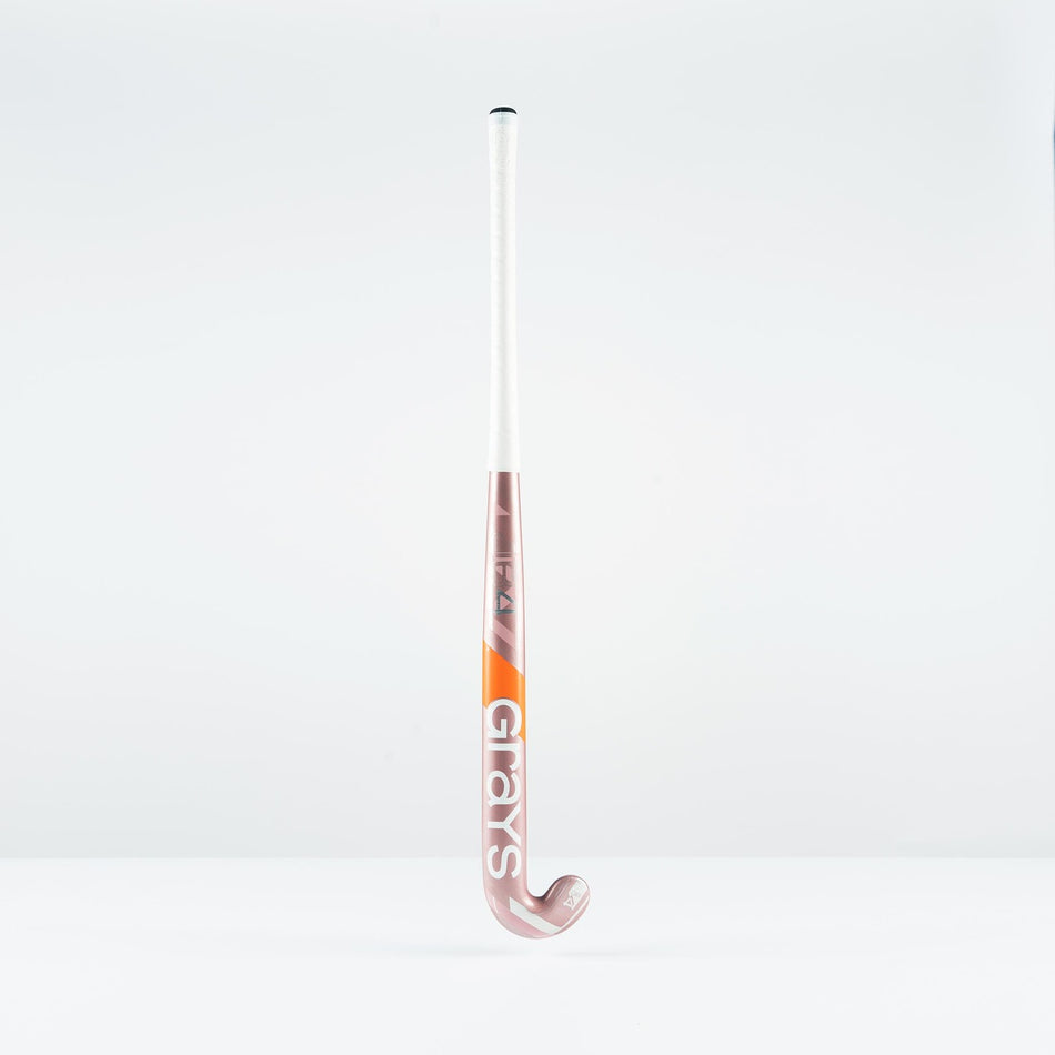 The Grays JB 4 Senior Hockey Stick 2026, in pink and white with "Grays" branding and a Jumbow blade profile, stands upright against a plain white background.