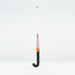 The Grays JB 4 Junior Hockey Stick 2026, featuring a white handle, orange and pink Grays branding, and a black curved end for drag-flicking, stands upright against a plain white background.