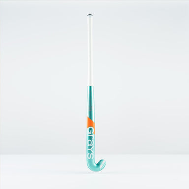 The Grays DB 5 Junior Hockey Stick 2026, in teal and white with orange accents and a Dynabow blade, stands upright on a white surface against a plain white background.