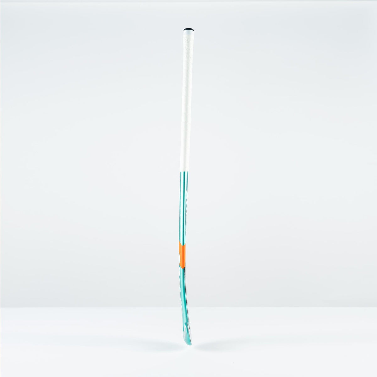 The Grays DB 5 Senior Hockey Stick 2026 by Grays, with a white handle, teal shaft, and orange accent, stands upright against a white background, offering intermediate control for players who value precision.