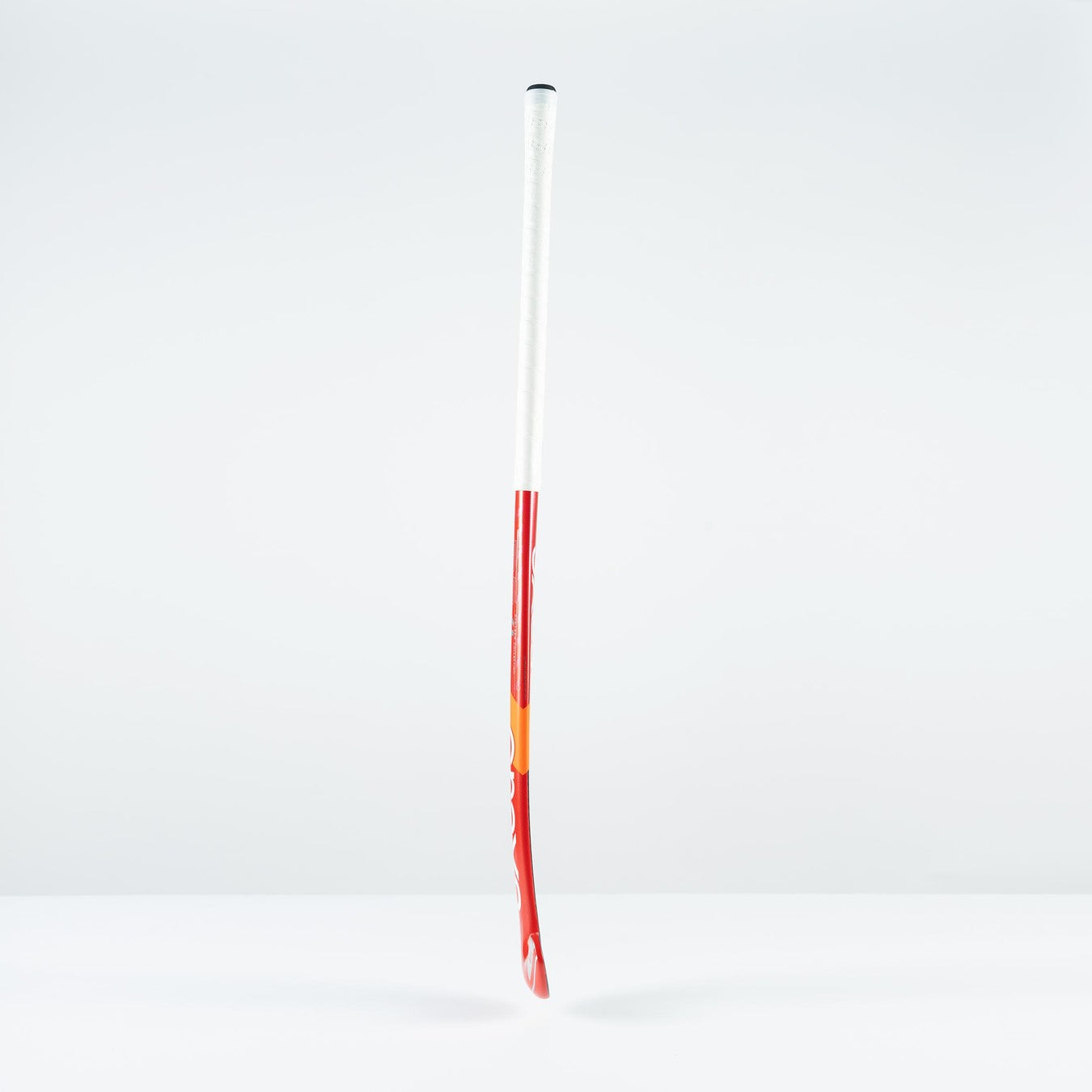 A red and white Grays DB 4 Senior Hockey Stick 2026 with a Dynabow blade profile stands upright against a plain white background.