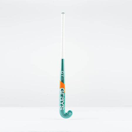 The Grays GT 8 Senior Hockey Stick 2026 stands upright against a white background, featuring teal and white colors with orange accents and aluminised-carbon construction. The brand name Grays is written vertically on the stick.