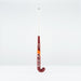 The Grays GT 5 Junior Hockey Stick 2026, featuring a red and white design with a high bow apex and bold Grays branding, stands upright against a plain white background.