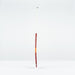The Grays GT 5 Senior Hockey Stick 2026, in red and white with a high bow apex, stands upright on a white surface, providing intermediate power and control against a plain light gray background.