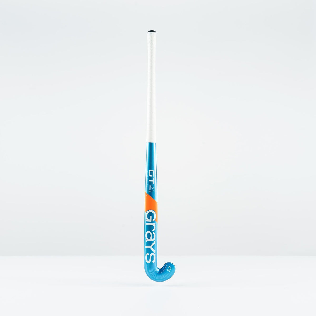 The Grays GT 4 Junior Hockey Stick 2026, in blue and designed for intermediate control, stands upright against a plain white background.