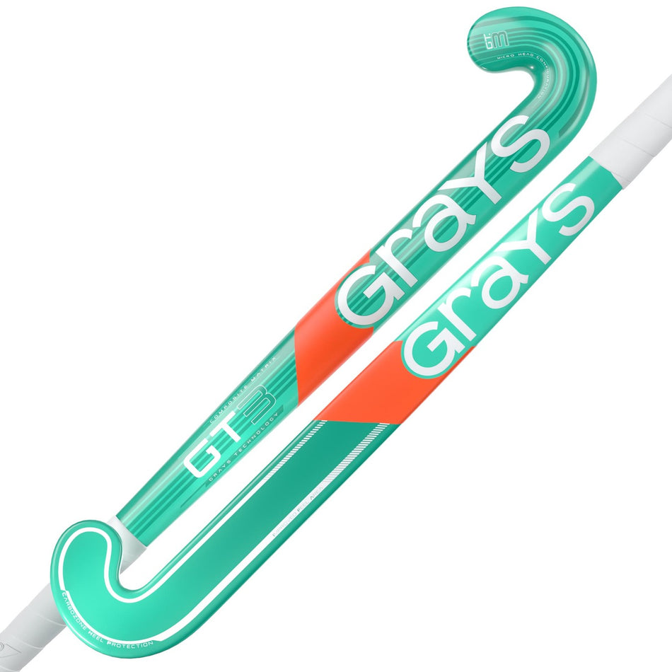Two mint Grays GT 3 Senior Hockey Sticks 2026 are crossed on a white background, offering reliable all-round performance with balanced power and control.