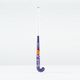 The Grays GT 3 Junior Hockey Stick 2026, in purple with a white grip and orange accents, displays the Grays brand on the shaft. Designed for balanced power and control, it stands upright against a plain white background.