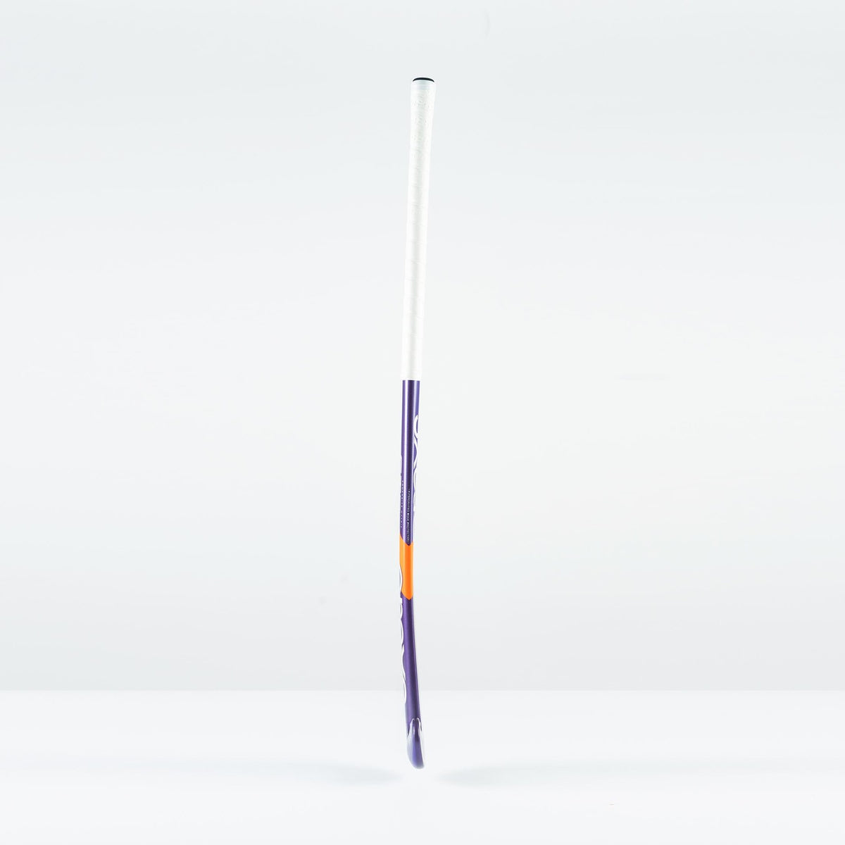 The Grays GT 3 Senior Hockey Stick 2026 stands upright on a white surface, featuring a white grip, purple shaft, and orange accent—perfect for players seeking balanced performance with moderate power and control.