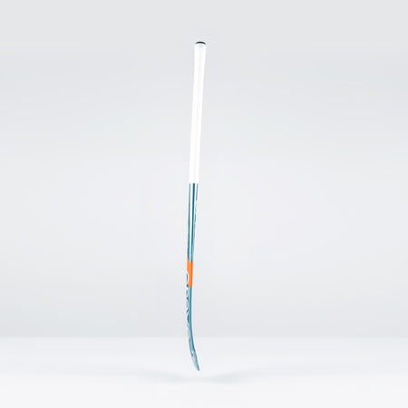 The Grays JB6Xi Jumbow Indoor Senior Hockey Stick 2026, featuring a white handle, blue shaft, and orange accent with a Jumbow blade, stands upright against a plain light gray background.