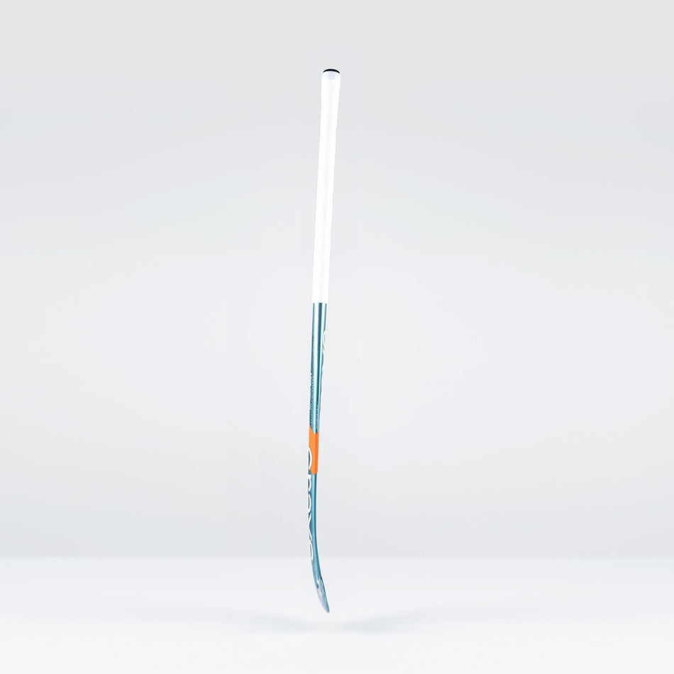 The Grays JB6Xi Jumbow Indoor Senior Hockey Stick 2026, featuring a white handle, blue shaft, and orange accent with a Jumbow blade, stands upright against a plain light gray background.
