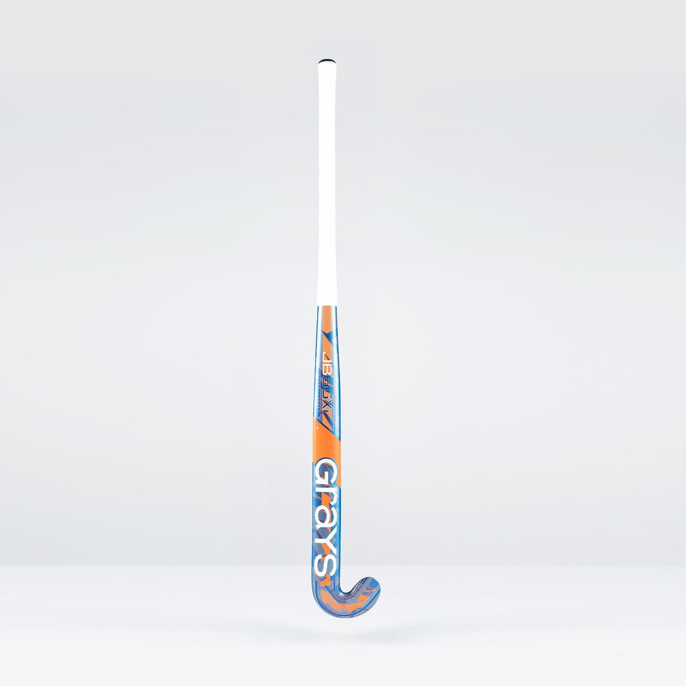 The Grays JB6GXi Jumbow Indoor Senior Hockey Stick stands upright against a plain light background, displaying its white handle and orange-blue shaft with bold GRAYS branding, designed for effective drag flicking.