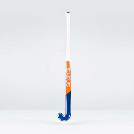 The Grays JB6GXi Jumbow Indoor Senior Hockey Stick, in blue, orange, and white, stands upright against a plain light gray background—expertly crafted by Grays for maximum control and precision in indoor play.