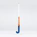 The Grays JB6GXi Jumbow Indoor Senior Hockey Stick, in blue, orange, and white, stands upright against a plain light gray background—expertly crafted by Grays for maximum control and precision in indoor play.