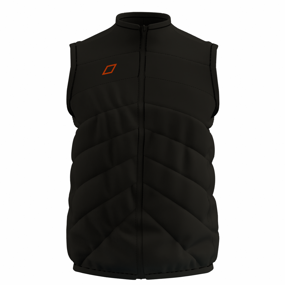 The Grays GTS Performance Body Warmer is a black, sleeveless padded vest with a zipper front, high collar, small orange square logo on the chest, diagonal quilted stitching, and a fitted shape—ideal for cool weather layering.