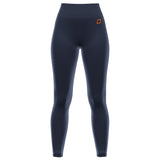 The Grays GTS Womens Hockey Leggings by Grays are dark navy high-waisted leggings with a fitted silhouette and a small orange rectangular logo on the left hip, inspired by performance sportswear and shown against a plain white background.
