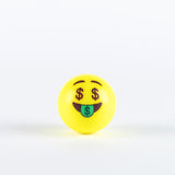 The Grays Emoji Hockey Ball by Grays features a yellow ball with an emoji face showing dollar sign eyes and a green tongue with a dollar symbol—ideal as a 2025 hockey player gift.