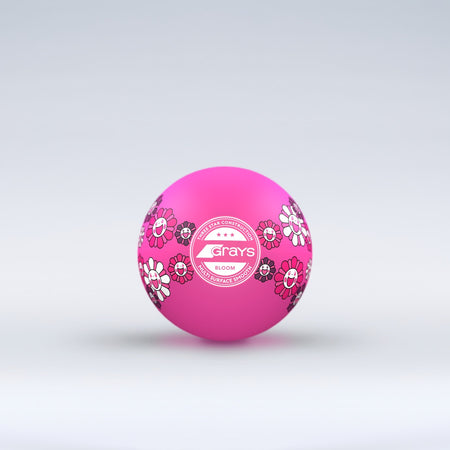 The Grays Novelty Hockey Ball 2026 features pink coloring with floral patterns, a central white Grays logo, and 3 star construction—perfect for hockey players. The ball sits against a light gray gradient background.