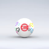 The Grays Novelty Hockey Ball 2026 features a white design with three-star construction, a red central logo, and colorful heart graphics—an eye-catching choice for any hockey player.