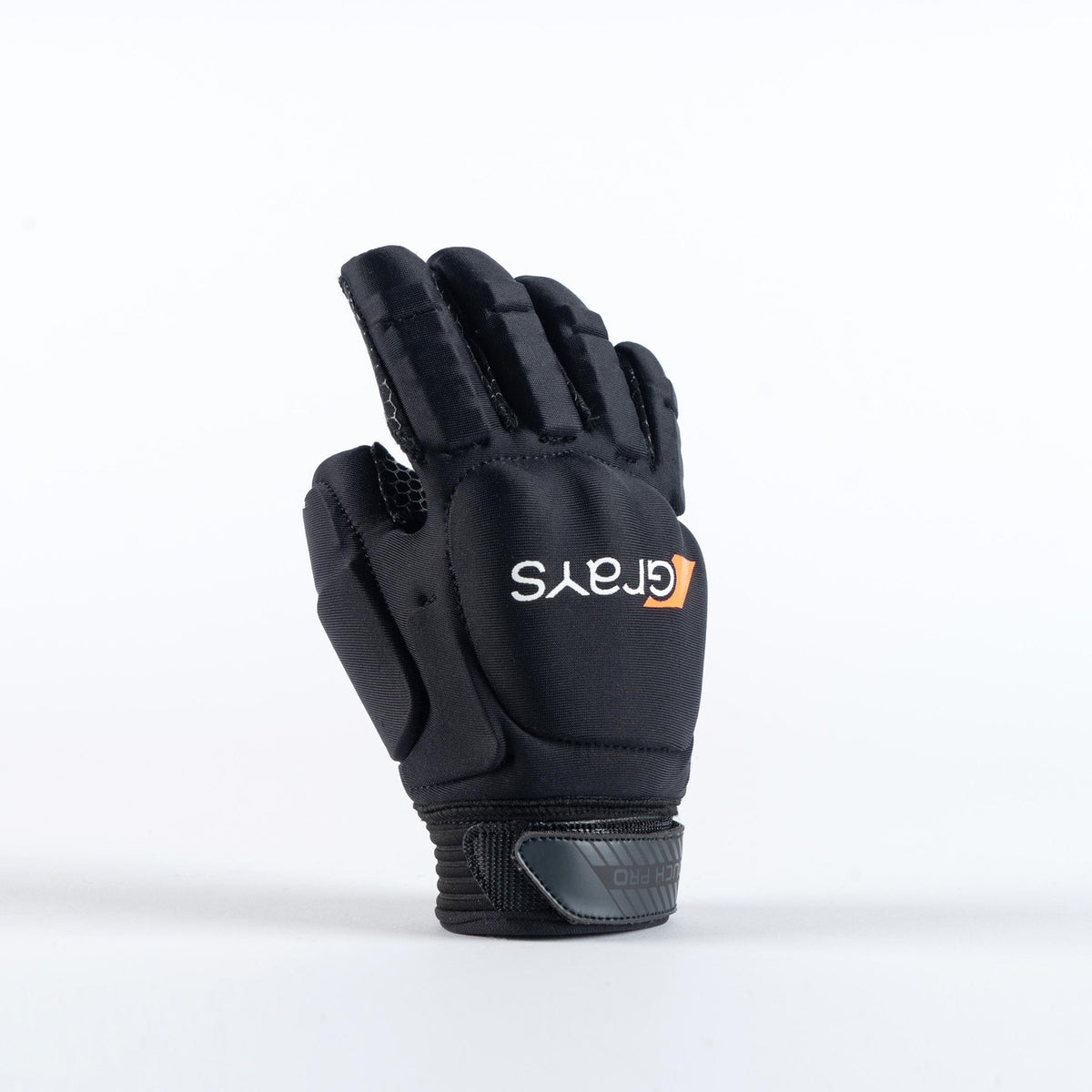 The Grays Touch Pro Hockey Glove in black stands upright on a white surface, featuring padded sections, full finger coverage, knuckle armor, a secure Velcro strap, and the Grays logo in white and orange on the back.