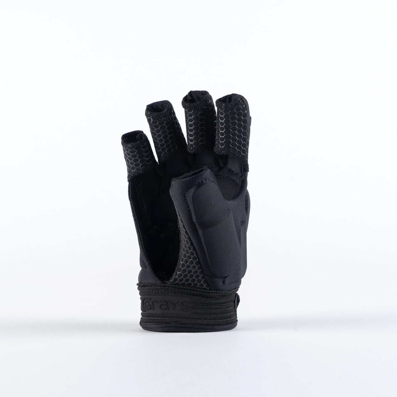 The Grays Touch Pro Hockey Glove by Grays is a black fingerless sports glove with textured palm grips and partial finger coverage, shown upright on a plain white background.
