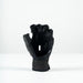 The Grays Prime Touch Hockey Glove by Grays is a black fingerless glove with padded knuckles, FlexShell armour, and a wide wrist strap, shown standing upright on a plain white surface.