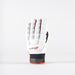 The Grays International Pro Hockey Glove in white stands upright, showcasing full-finger coverage, black and red accents, finger padding, and a lycra palm for flexible, all-weather grip.