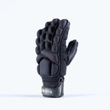 The Grays Apex Full Hockey Glove in black features EVA Foam padding, protective finger and back segments, and a wrist strap with the Grays logo in red and white, shown standing upright against a plain light background.