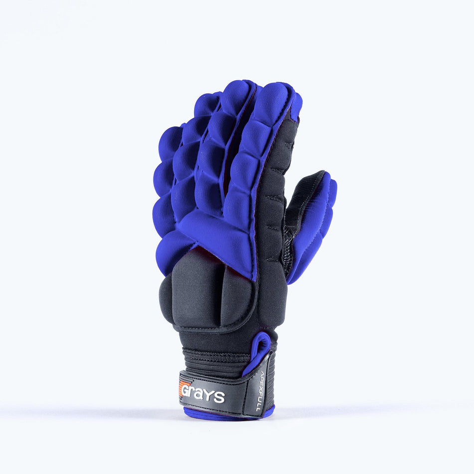 The Grays Apex Full Hockey Glove is a blue, full-finger sports glove with EVA foam padding and protective segments for impact protection, featuring a wrist strap labeled "Grays," ideal for field hockey.