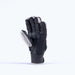 The Grays Apex Full Hockey Glove by Grays is shown upright against a plain background, displaying its full-finger black and white EVA Foam design with the Climagrip Pro Palm visible and the fingers slightly curved.