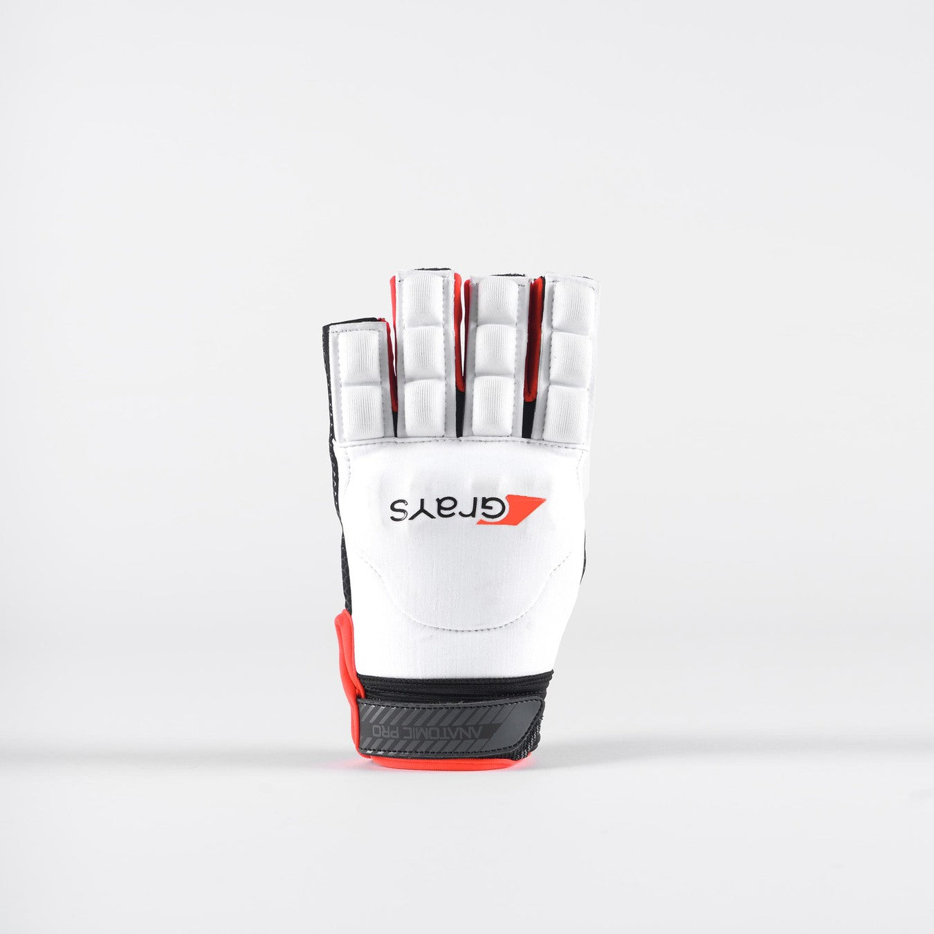 The Grays Anatomic Pro Hockey Glove by Grays features a white design with black and red accents, moulded knuckle armour, padded fingers, and the Grays logo on the back, shown against a plain white background.