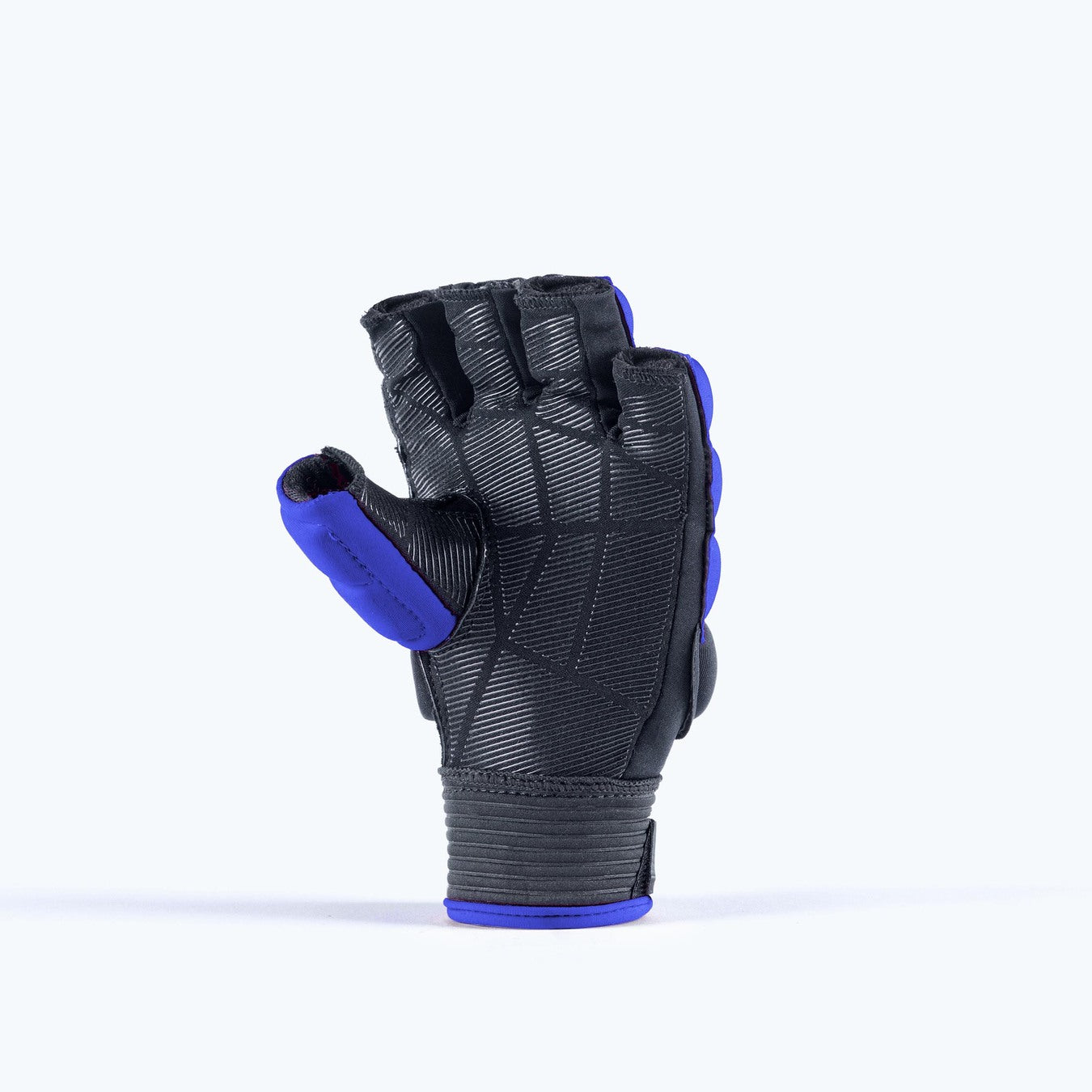 The Grays Apex Touch Hockey Glove by Grays features black EVA foam with a half-finger design and blue trim, standing upright on a plain light background, palm side forward and thumb extended.