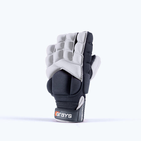 The Grays Apex Touch Hockey Glove is a single white padded sports glove with an all-weather grip and Grays branding on the wrist strap, designed for hand protection during field hockey.