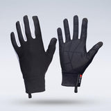 Two black Grays Therma Full Hockey Gloves by Grays stand upright on a light gray background, showcasing an all-weather textured grip on the palms, a full-finger design with white details, and pull tabs at the cuffs.