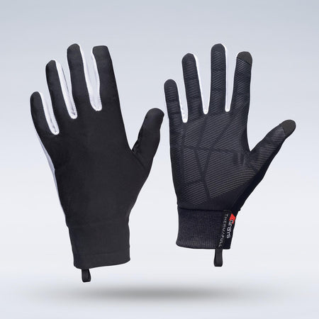 Two black Grays Therma Full Hockey Gloves by Grays stand upright on a light gray background, showcasing an all-weather textured grip on the palms, a full-finger design with white details, and pull tabs at the cuffs.