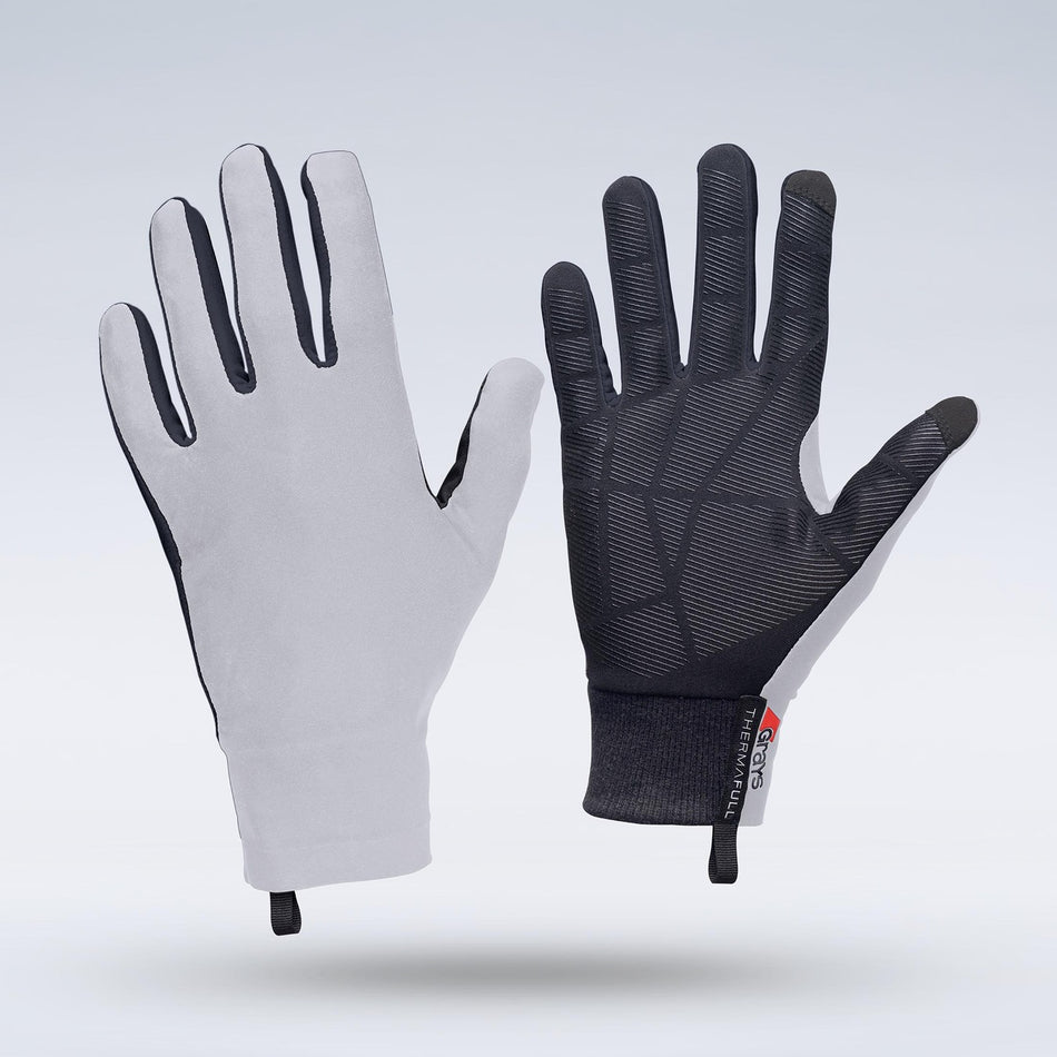 A pair of lightweight, ergonomic Grays Therma Full Hockey Gloves by Grays in white, featuring long fingers and a sleek full-finger design—one glove reveals the gray palm while the other displays a black textured all-weather grip and small fabric tag.