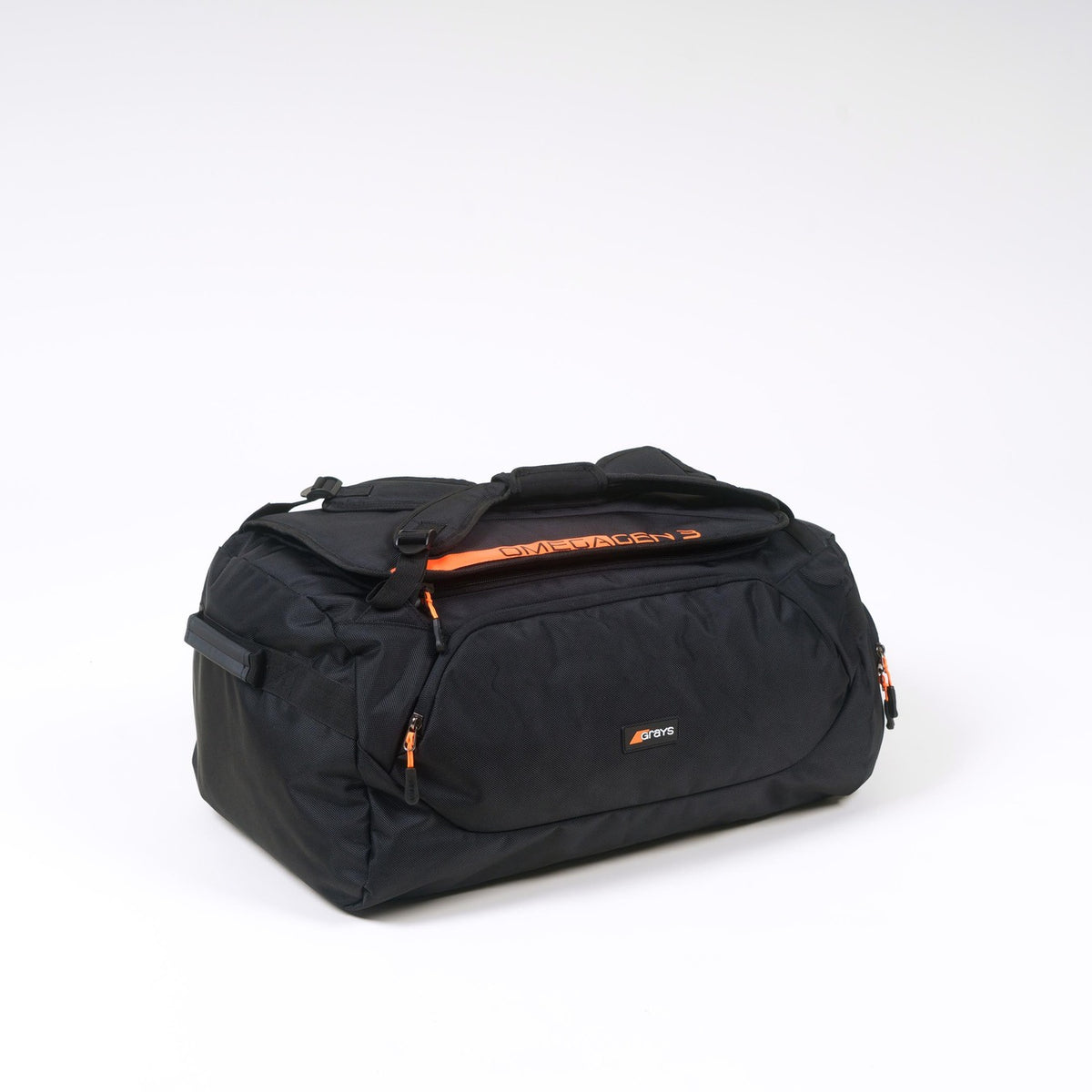 The Grays Omega Gen 3 Holdall by Grays is a black backpack with orange zipper details, an orange top handle, and a roomy shoe pocket—expertly showcased against a plain white background.