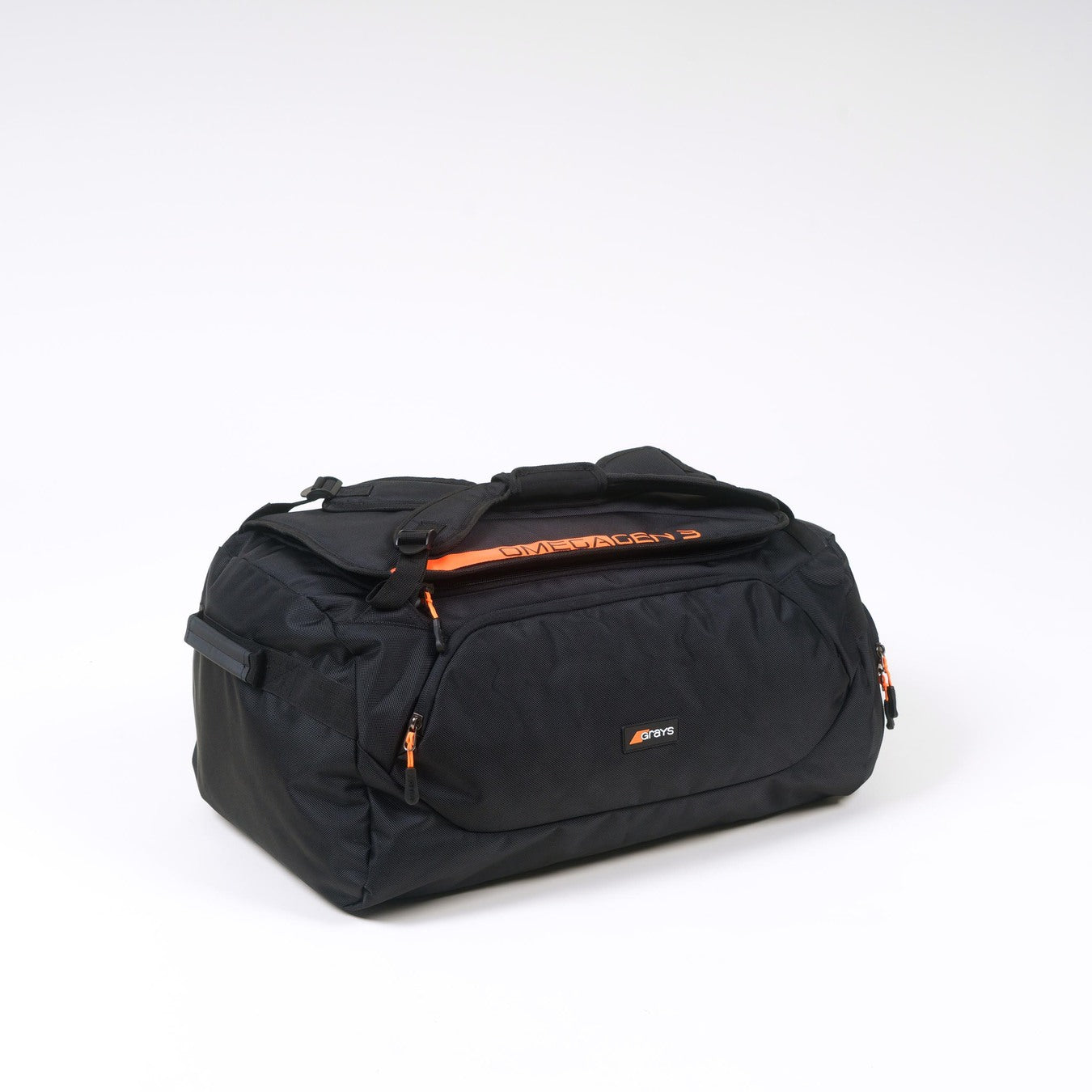 The Grays Omega Gen 3 Holdall by Grays is a black backpack with orange zipper details, an orange top handle, and a roomy shoe pocket—expertly showcased against a plain white background.