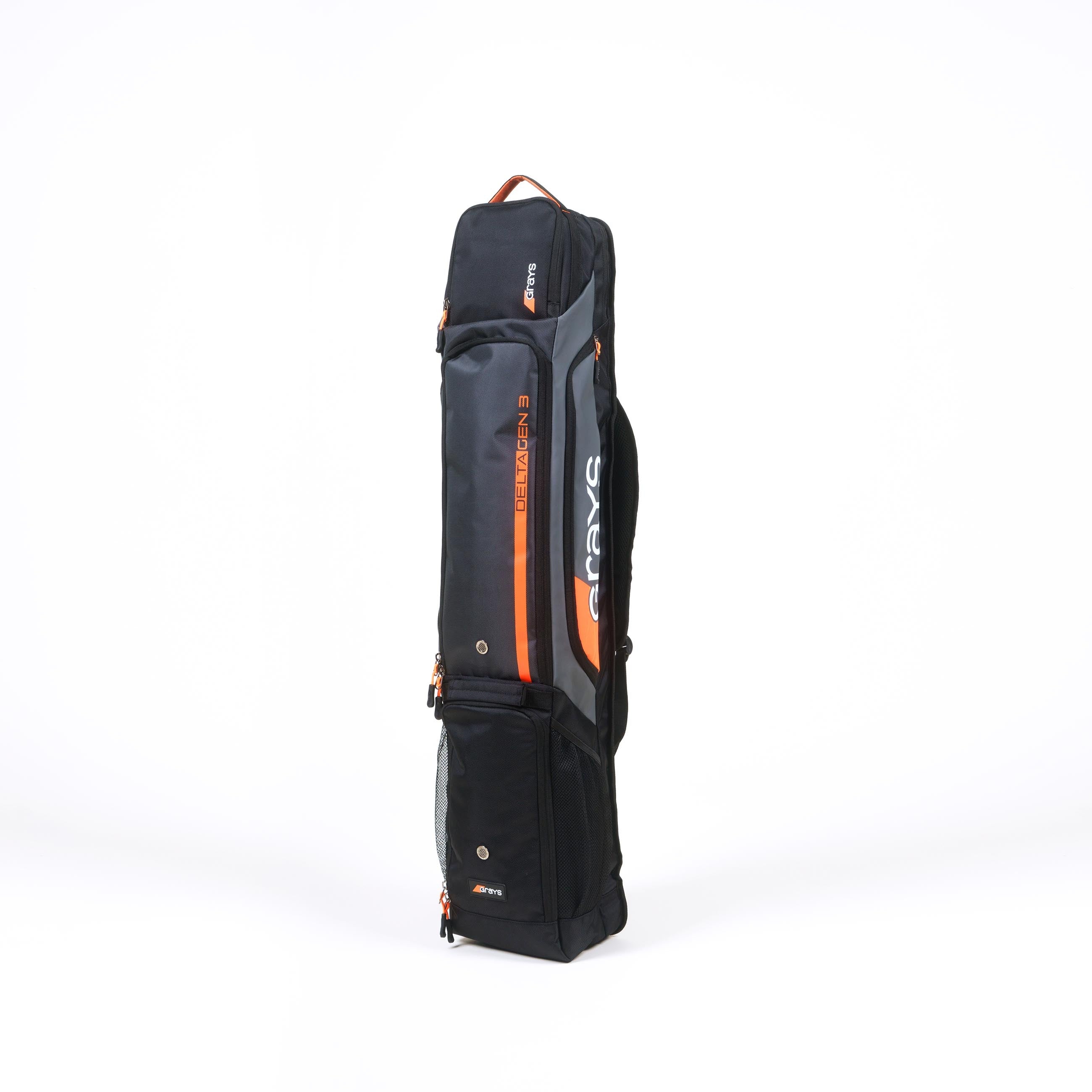 The Grays Delta Gen3 Hockey Kitbag by Grays is a black rectangular bag standing upright on a white background, featuring zippered compartments, a padded stick section, shoulder strap, gray accents, and visible Grays branding.