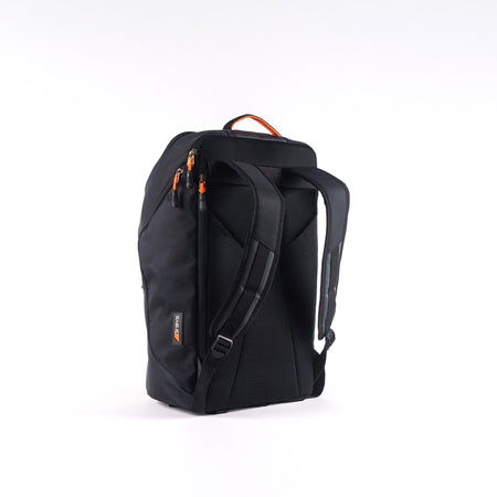 The Grays XI Gen 3 Rucksack by Grays stands upright on a white background, featuring padded shoulder straps, a mesh back panel, orange zipper pulls, and a padded laptop pocket.