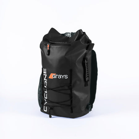 The Grays Cyclone WP Rucksack in black features a top roll closure, front zip pocket, side mesh pockets, bungee cord detail, and spacious storage. The Grays logo in white and orange is on the front. Perfect as a waterproof sports bag.