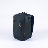 The Grays XI Gen 4 Rucksack, a black sports backpack with orange zipper pulls, front pocket, and top handle, is shown on a plain white background. The Grays logo appears on the front pocket, making it an ideal hockey rucksack.