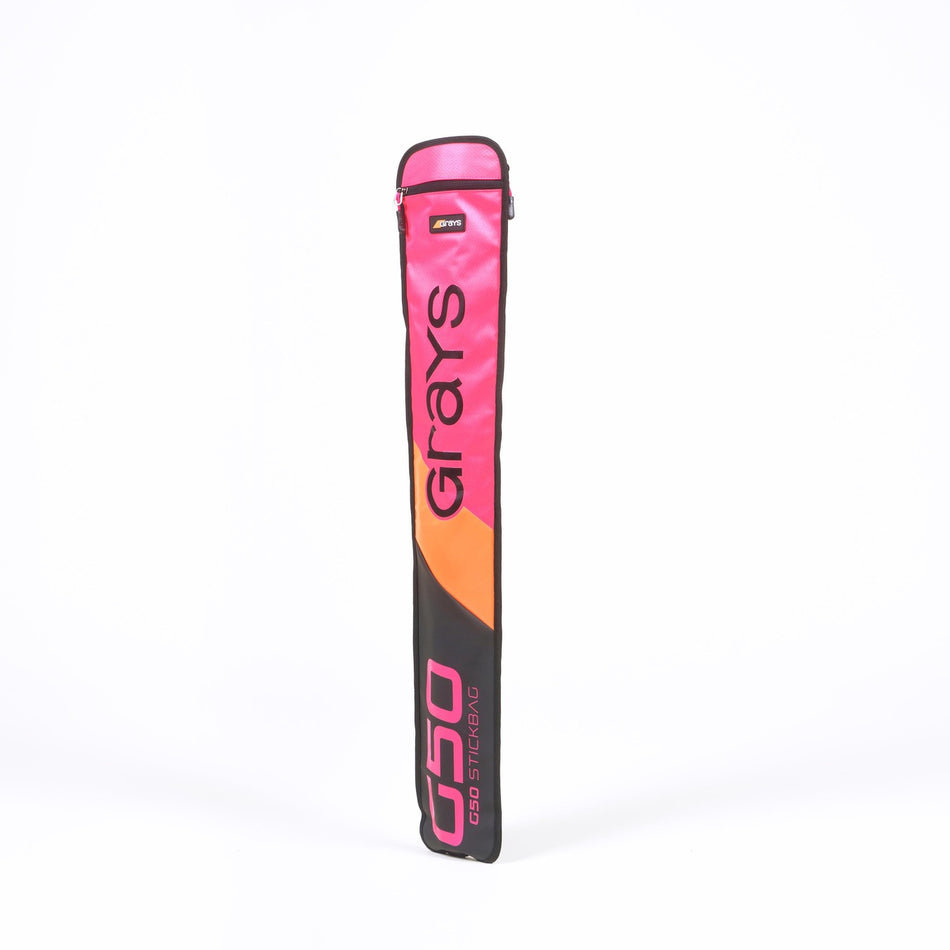 The Grays G50 Stick Bag by Grays in pink, orange, and black features water-repellent fabric, a zippered top, bold front branding, and an adjustable strap for easy carrying; shown upright on a white background.
