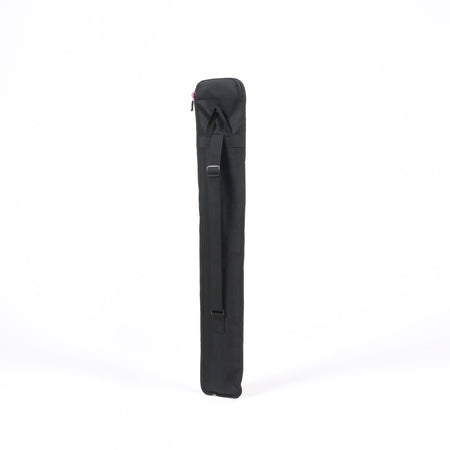 The Grays G50 Stick Bag by Grays is a long, rectangular black bag with a water-repellent finish. It features a top zipper and an adjustable shoulder strap, standing upright against a plain white background.