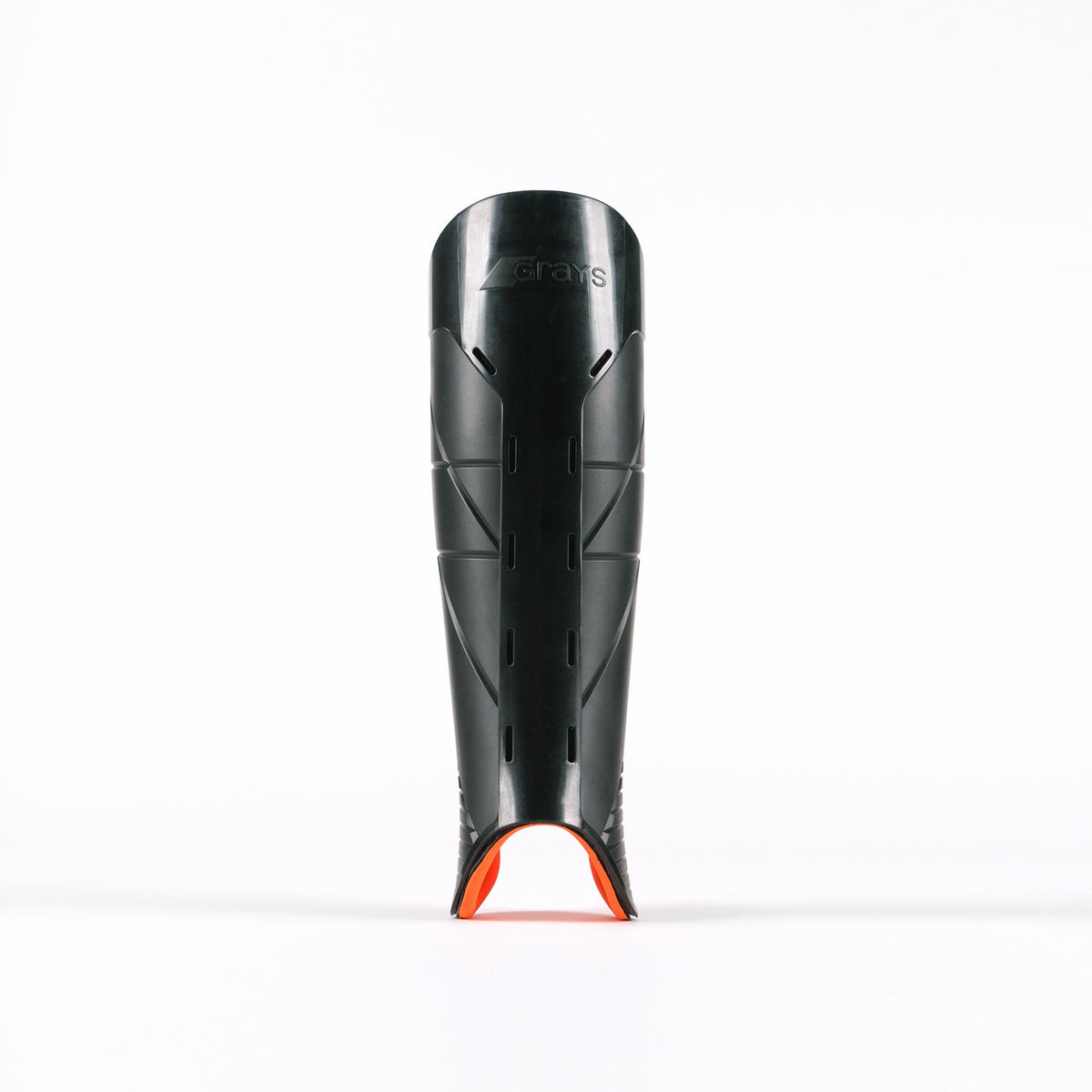 A black Grays Hockey G900 Shinguard with small ventilation slits and an orange accent at the bottom, made from advanced flexible polymer for top protection, stands upright on a white background.