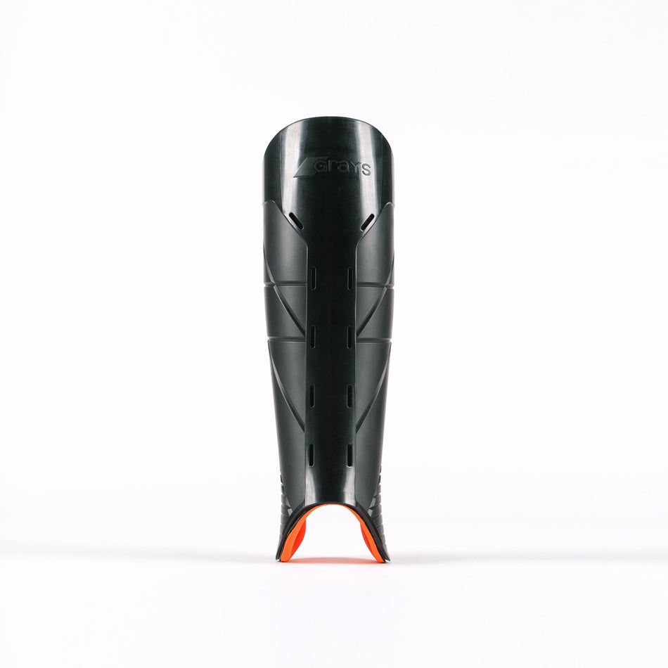 A black Grays Hockey G900 Shinguard with small ventilation slits and an orange accent at the bottom, made from advanced flexible polymer for top protection, stands upright on a white background.