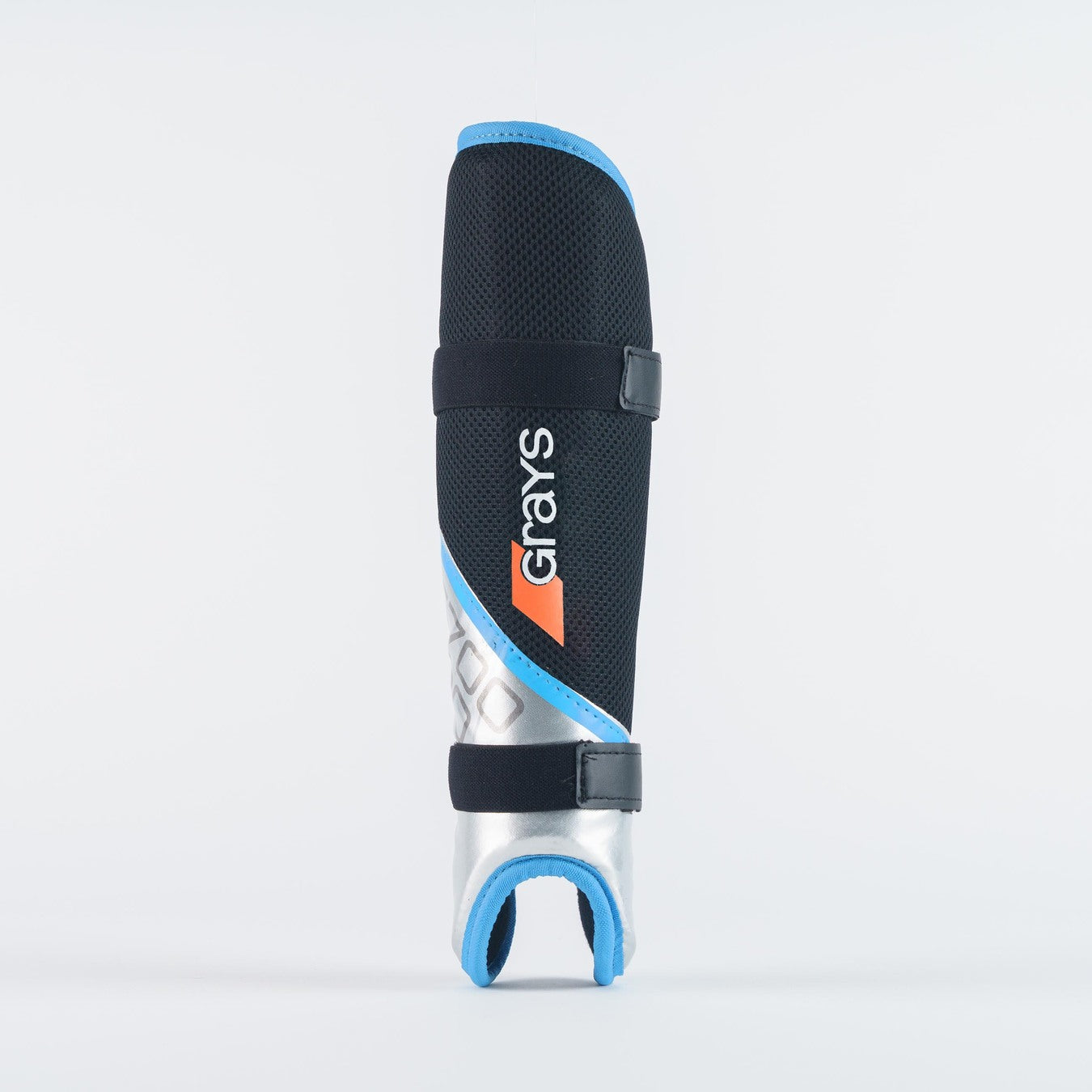 The Grays G700 Pro Shinguards by Grays are black/sky, feature an anatomical fit, two black straps, a sculptured hard outer shell, blue trim, and display the Grays logo vertically on the front.
