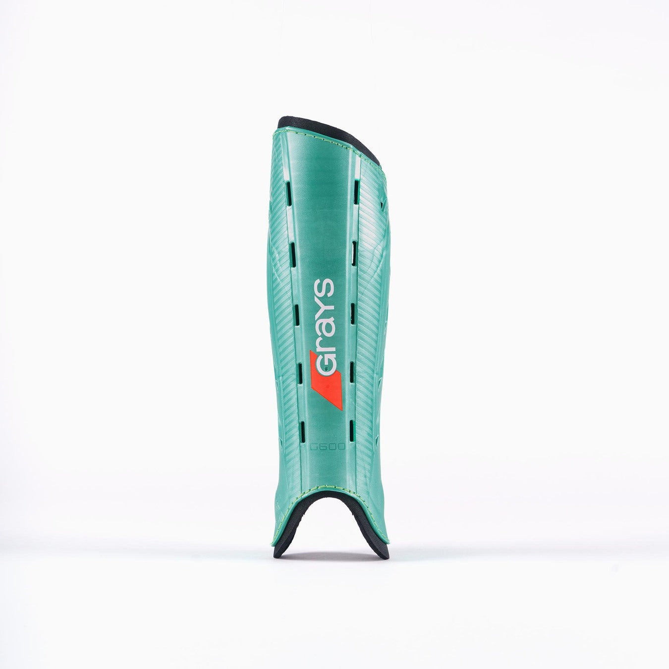 A single Grays G600 Shinguard in black and aqua stands upright on a white background, featuring an anatomically designed shell for enhanced protection against shin injuries.