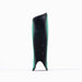 The Grays G600 Hockey Shinguard by Grays, shown upright on a white background with its padded side facing forward, features a green and black design and a lightweight polymer shell for superior impact protection.