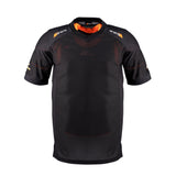 The Grays Elite Pro S/S Smock - Junior is a black short-sleeve jersey with orange shoulder and collar accents, subtle branding on the chest and sleeves, and made from breathable popcorn mesh. Brand: Grays. Color: Black.